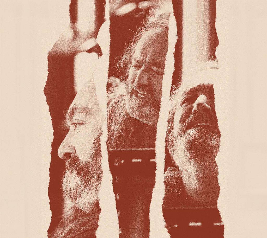 Album art with 3 strips of paper showing snippets of Martin's face